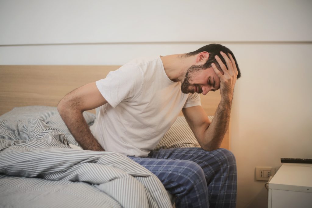 Young Man In Sleepwear Suffering From Headache In Morning 3771115 Foto Di Andrea Piacquadio Da Pexels 1024x683